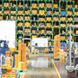 Company interior view with various machines and equipment. mostly yellow