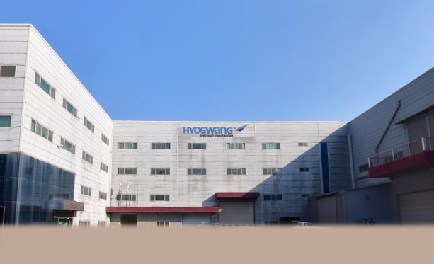 Company exterior with a logo written in blue that says Hyokwang on a white background